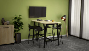 Cubit bar leaner with Raven bar stools help elevate this meeting room space