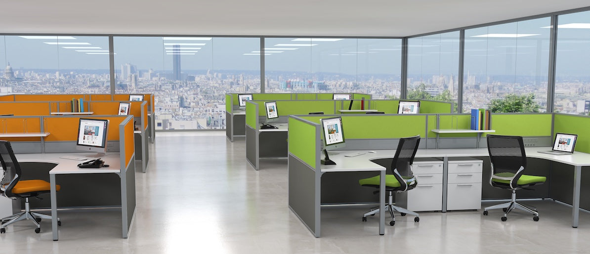 Partitions orange and lime colour, around desks in open plan office