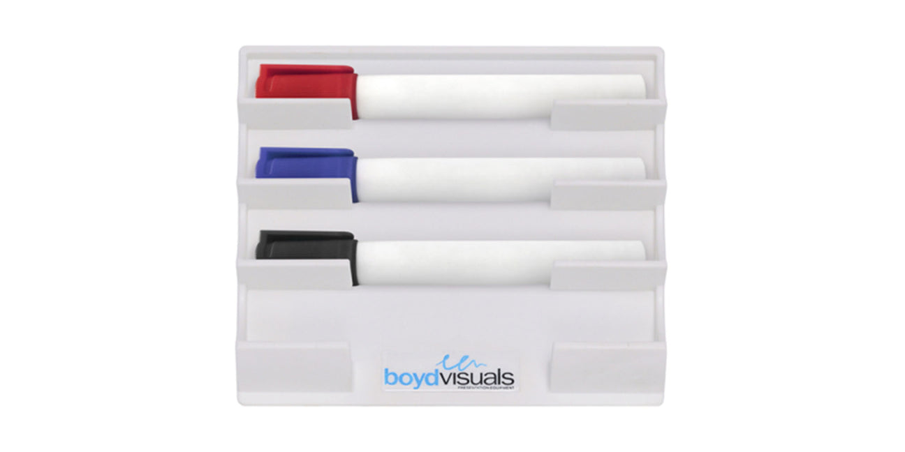 whiteboard pens in a holder