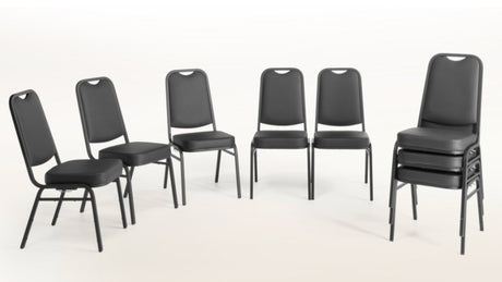 Unite stackable chairs with black vinyl and black frame organised in a semi circle